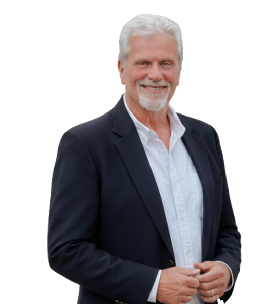 Doyle Lightfoot, construction expert with over 30 years of experience, smiling in professional attire, standing confidently against a neutral background.